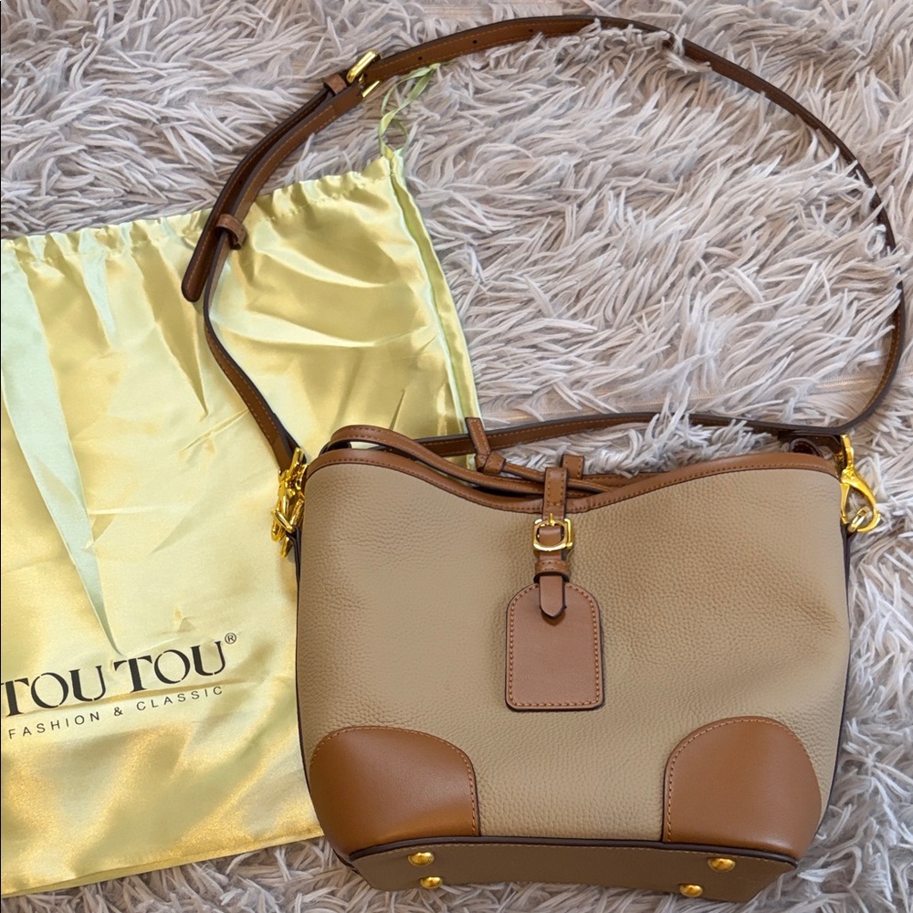 Real pebbled leather 2 tone Tan & Brown Bucket Bag with luggage tag decor